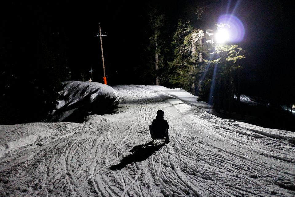 Night sledding by floodlight at the Gnadenalm in Obertauern