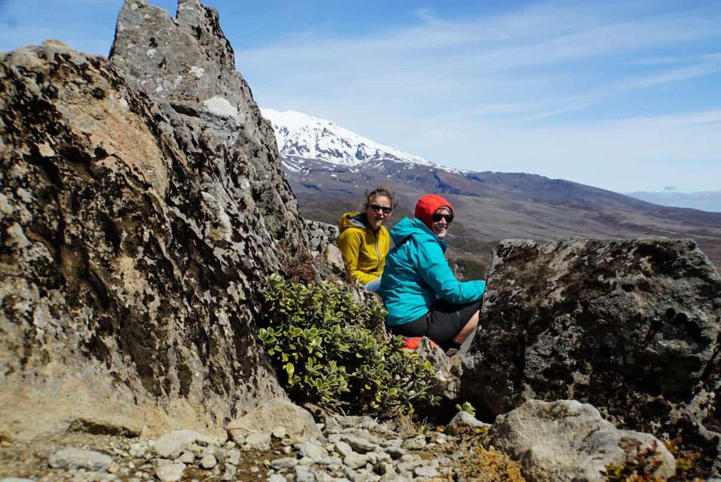 Resting with a view while hiking in Tongariro National Park