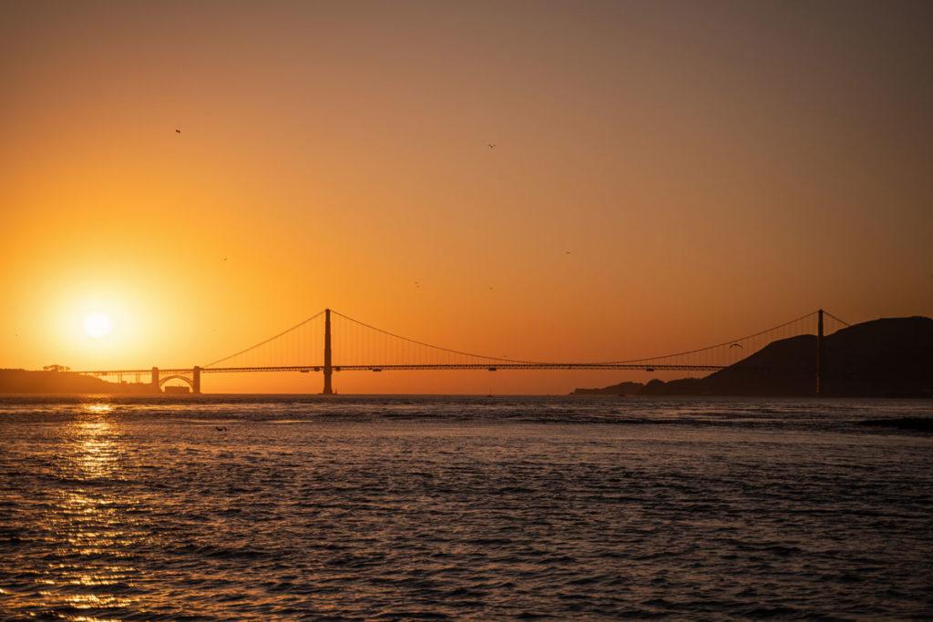Sunset at Golden Gate Bridge on the return from Alcatraz