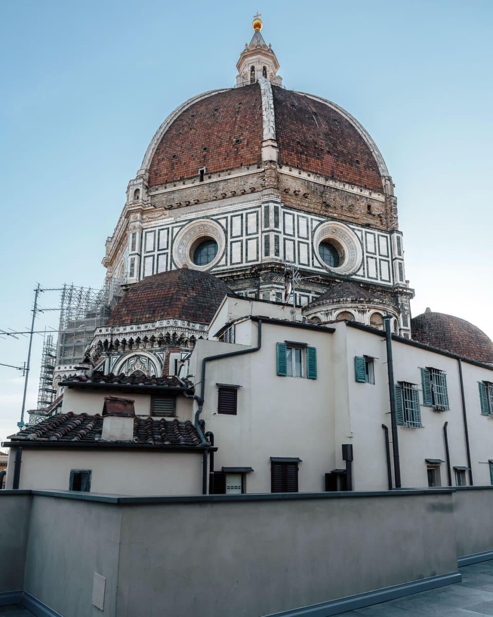Rooftop terrace of the Duomo Museum in Florence with a view of the Duomo