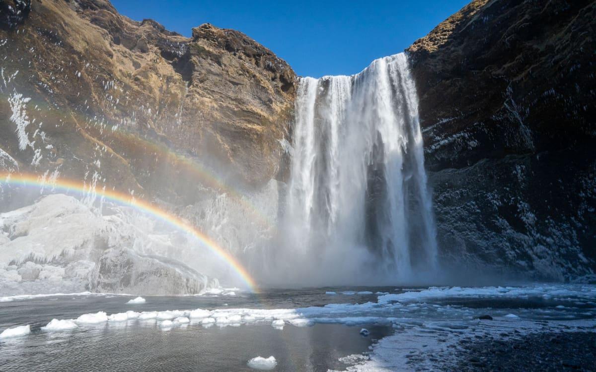 A week later with ice, sun, and a bit of snow: The Skogafoss in Iceland