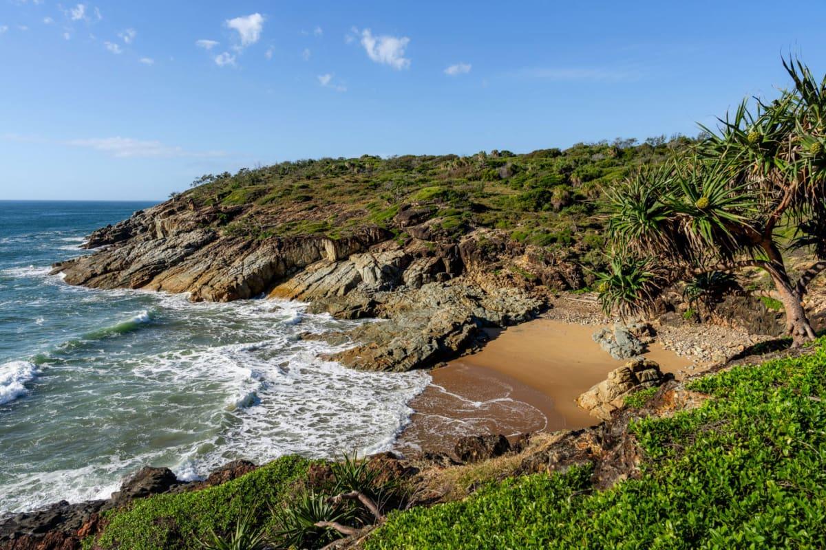 1770: Bustard Bay Lookout and view of the beach at high tide