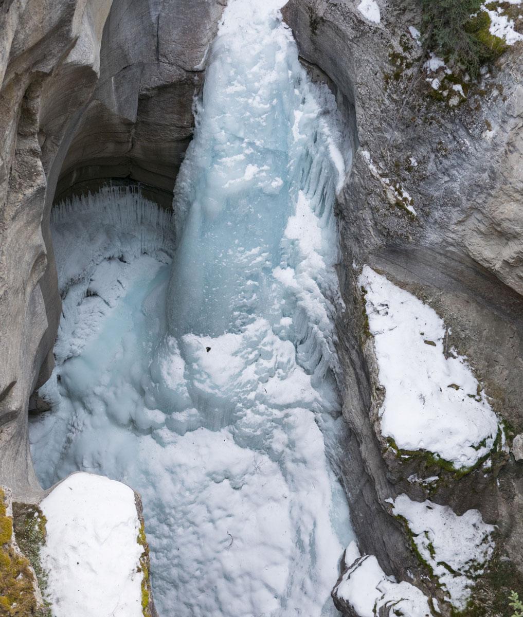 Rocky Mountains Canada Icewalk in Maligne Canyon thick ice layer at the waterfall